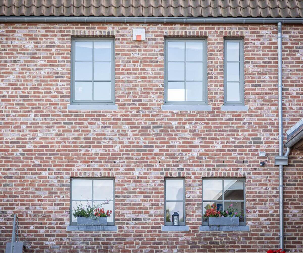 Pose de châssis en PVC Kömmerling à Saintes